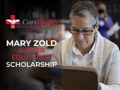 Mary Zold Higher Education Scholarship Announcement Image - Mary Zold Working On A Computer - CorrHealth - Correctional Healthcare - Medical Scholarship
